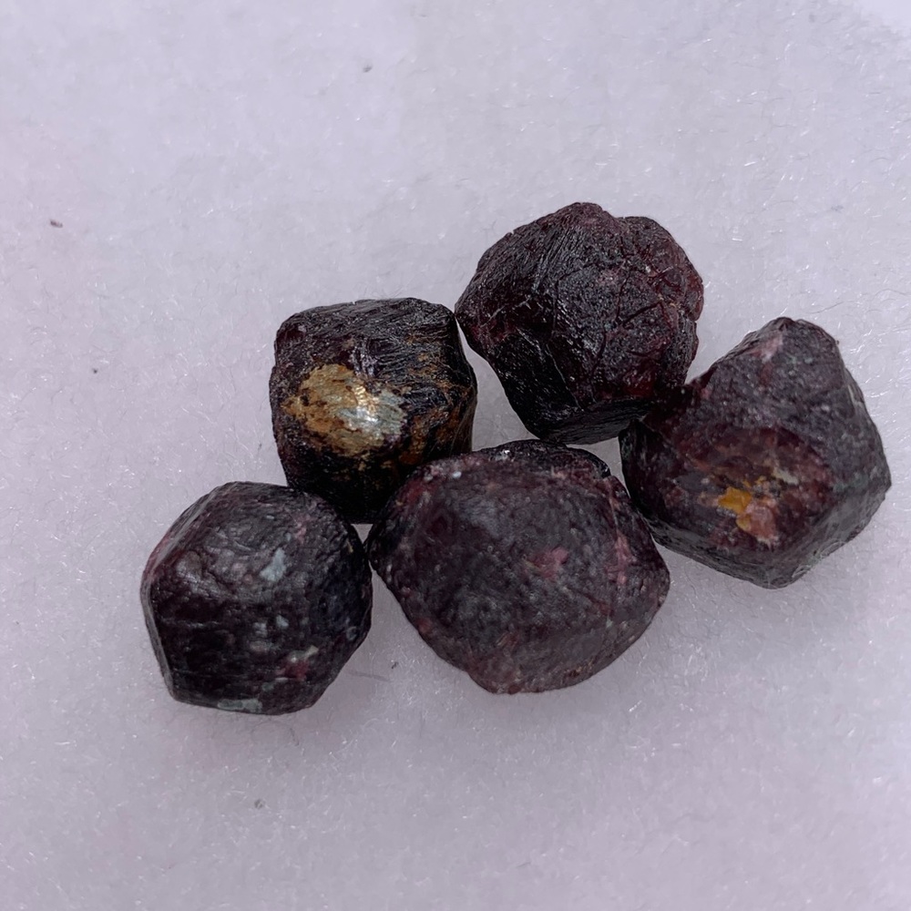 Raw garnet crystal heart and root chakra